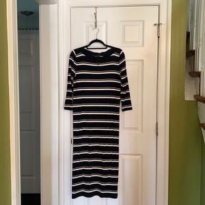 Navy dress with gold and white stripes.